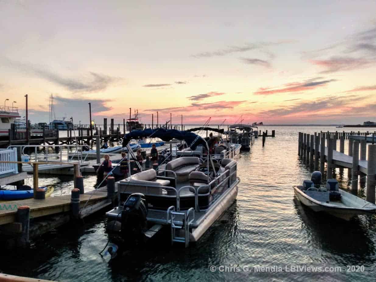 Waterfront view at Polly's Dock in Beach Haven at sunset.
